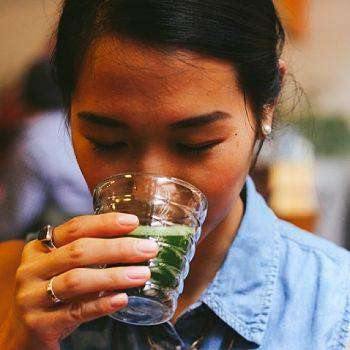 Gir Drinking Matcha Green Tea at japanese tea Ceremony